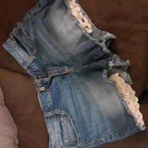 Arizona Jean shorts with crocheted  eyelet pockets size 13